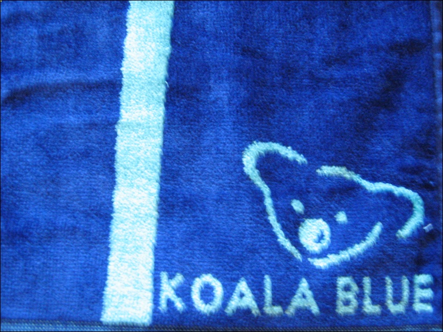 Olivia Newton-John Koala Blue beach towels 2007 - reef