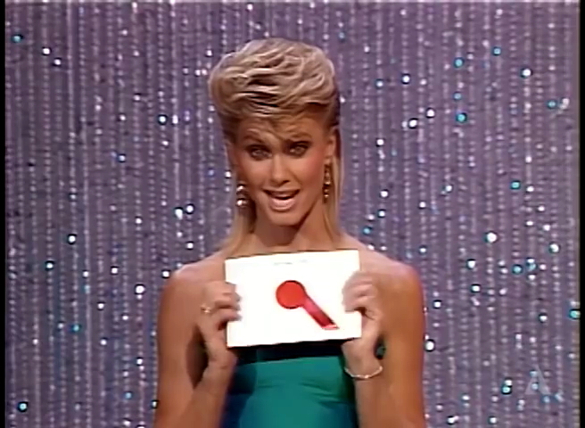 Olivia Newton-John presenting Oscar 1983