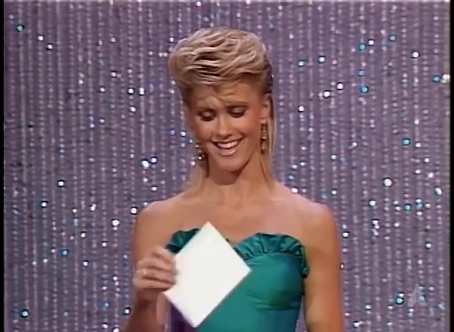 Olivia Newton-John presenting Oscar 1983