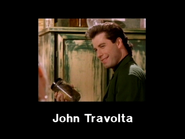 John Travolta in Liberian Girl video 