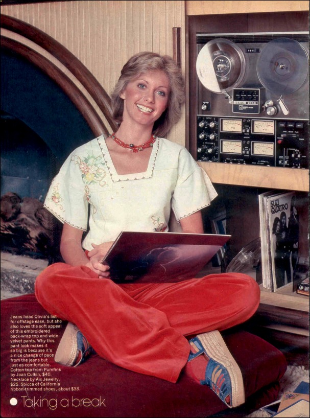 Olivia relaxes with record collection