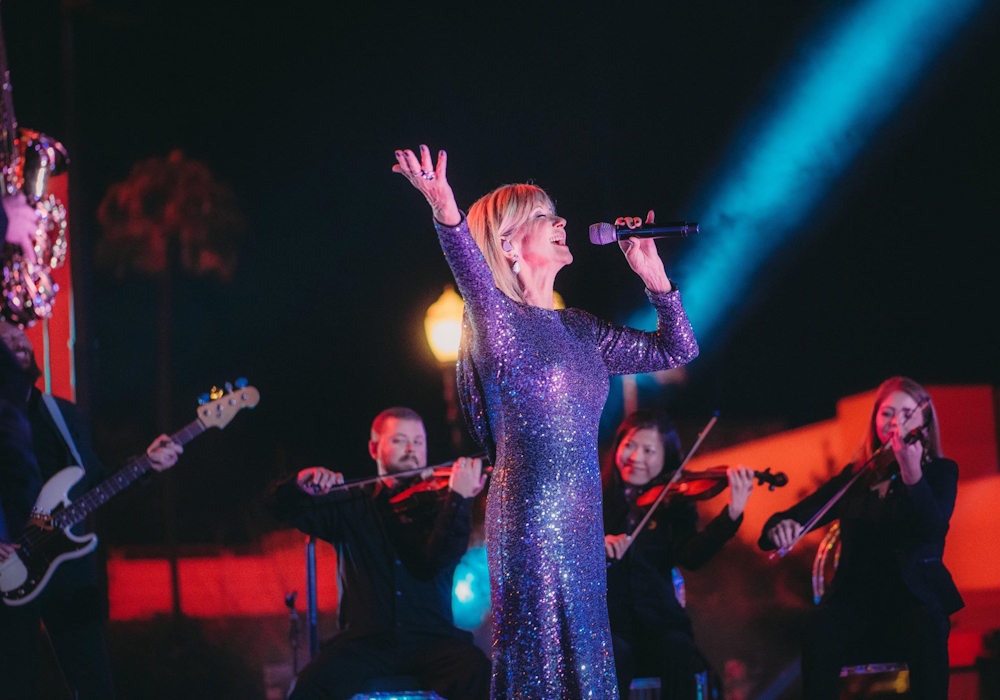 Olivia Newton-John performs at Disney's Fairy Tale Weddings 2018