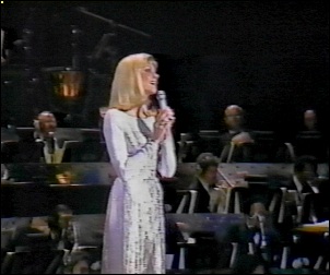 Olivia performs Hopelessly Devoted To You